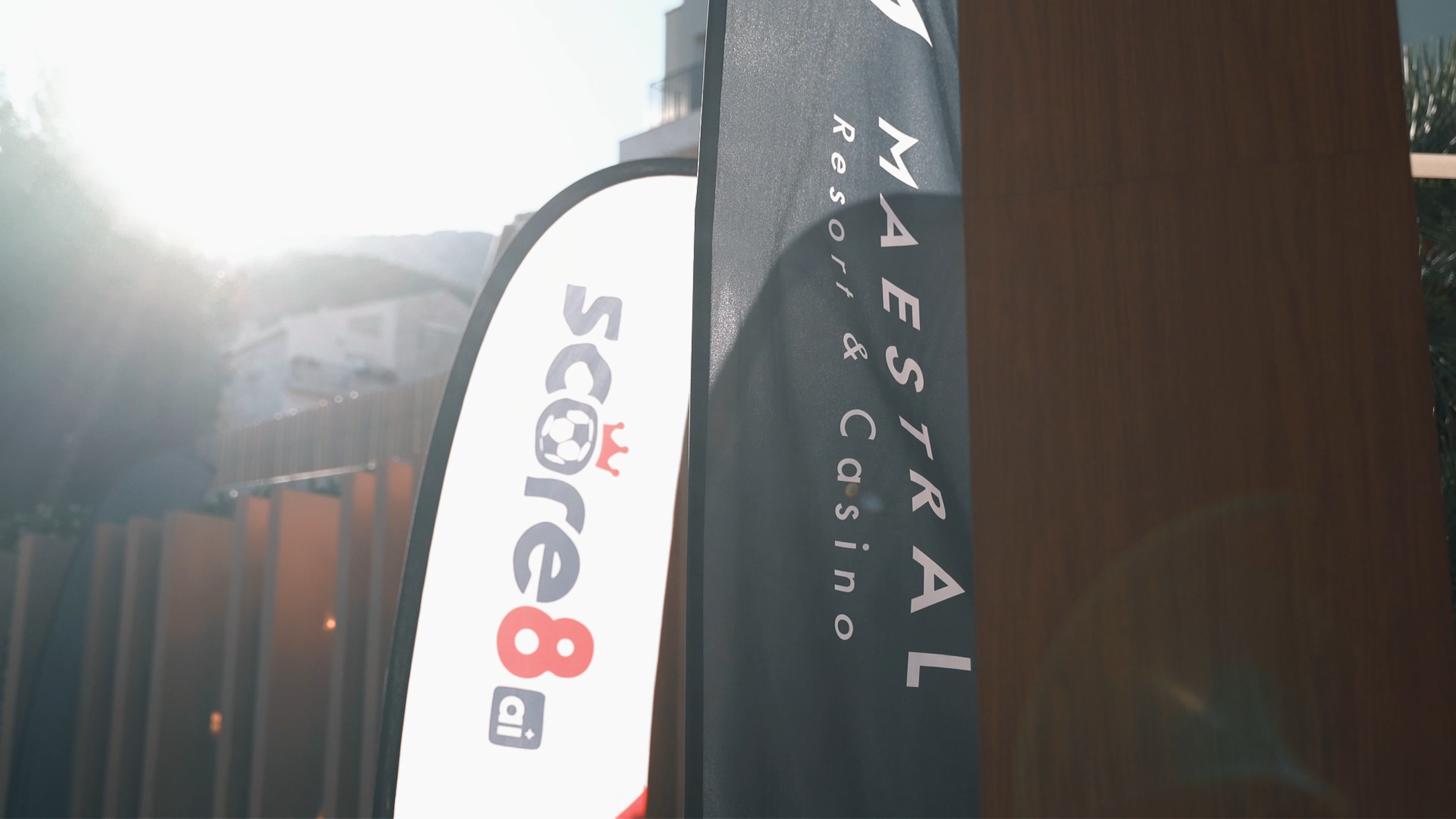 Score8 flag signage beside Maestral Resort and Casino branding